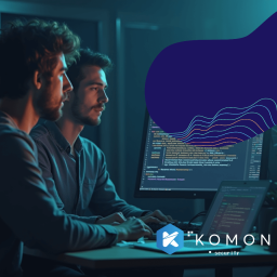 IT guys looking at a monitor where a code is on the screen.